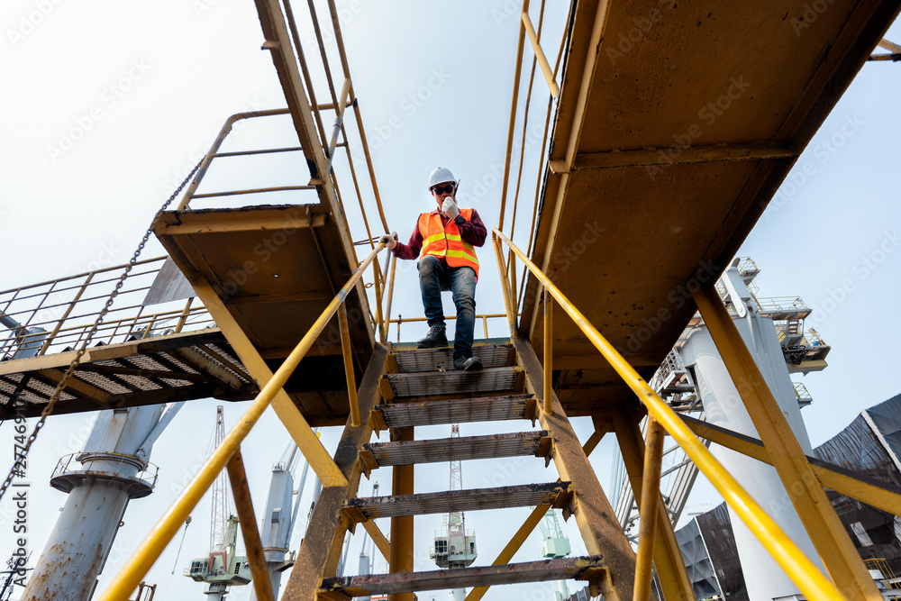 engineering foreman, supervisor, master controller in working place, command working area for safety