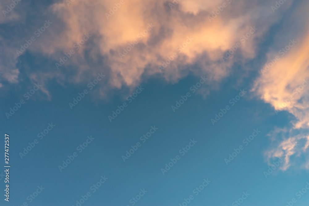 Natural background with clouds at sunset.