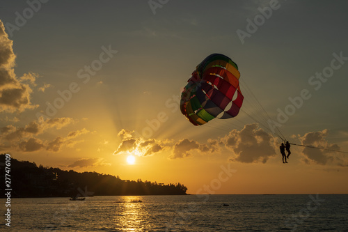 Sea Parachute at sunset time. Kamala Beach, Phuket, Thailand