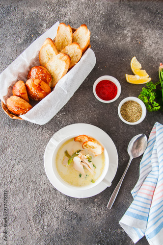 Creamy vegetable soup with chicken and croutons