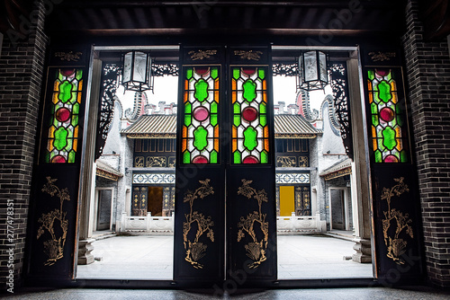 Interval door of the south ancient architectural courtyard of Zumiaoling, Foshan, Guangdong, China photo