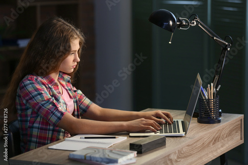 Teenage girl doing homework...