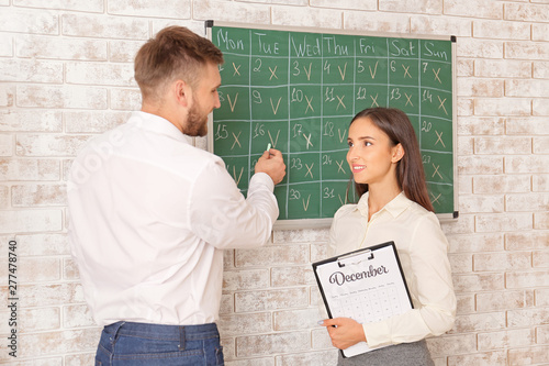 Office workers discussing i...