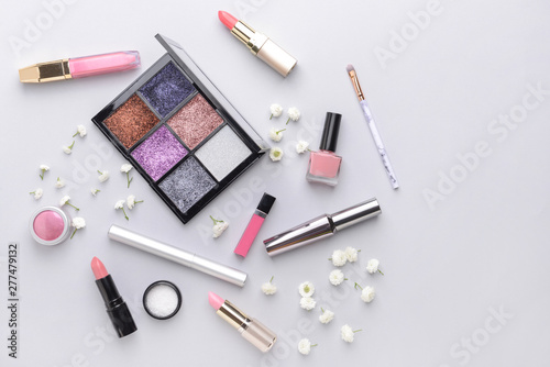 Set of decorative cosmetics on light background