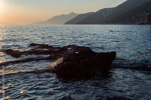 Fototapeta Naklejka Na Ścianę i Meble -  Beautiful sunset with rocks in the Adriatic sea, Dingac Borak, Dalmatia, Croatia, Peljesac peninsula