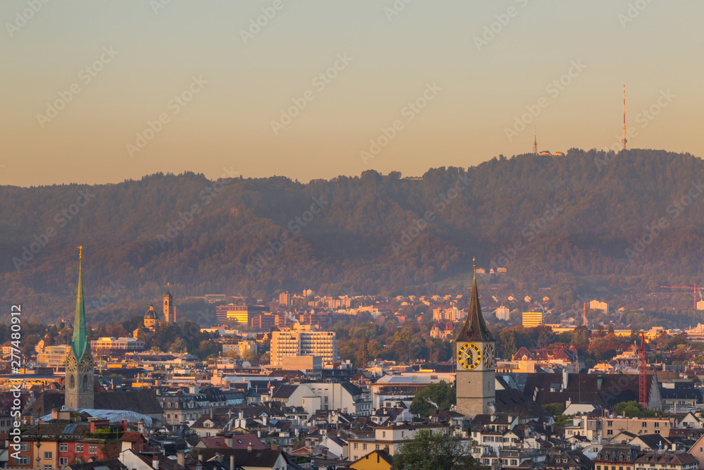 view on churches, roofs and Uetliberg of Zurich city
