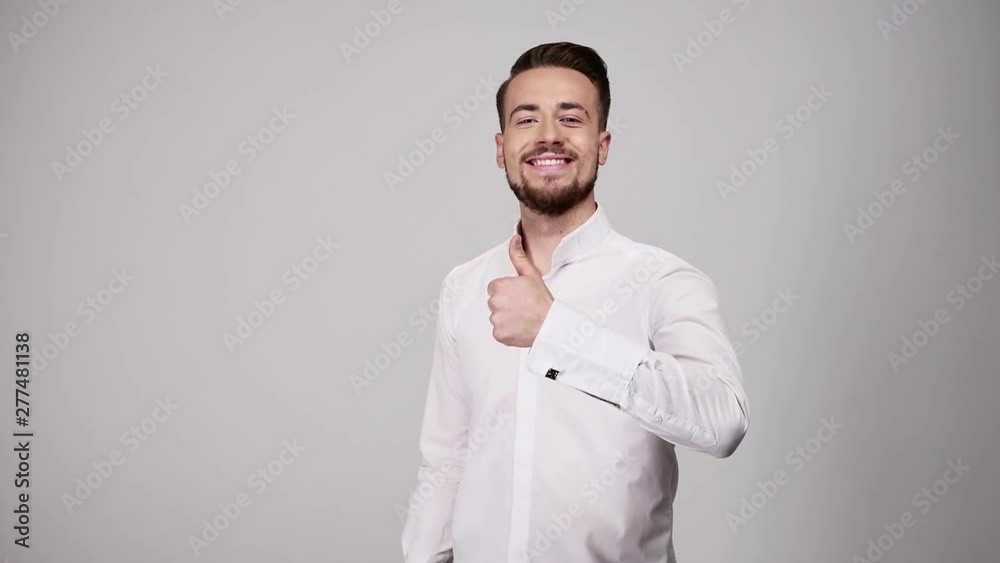 Likes and subscribe to the channel - gesture. Young man show thumbs up and finger to link. Likes and subscribe to the channel - gesture. Young man show thumbs up and finger to link.