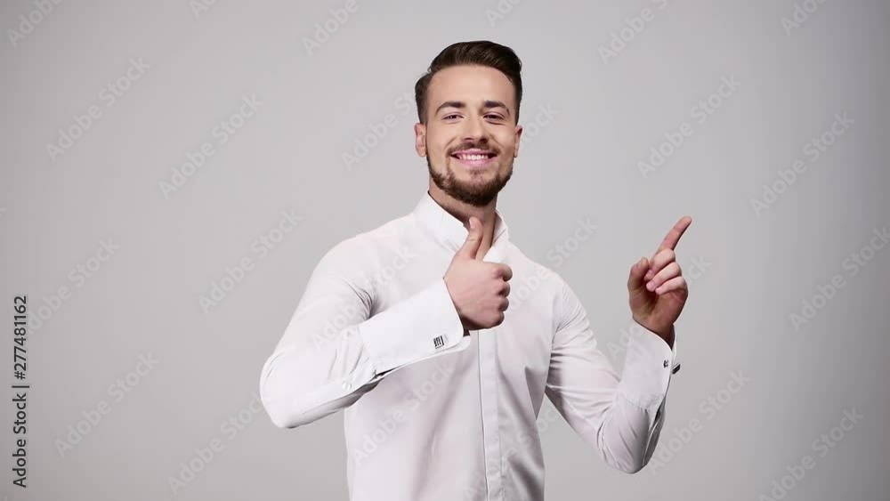 Likes and subscribe to the channel - gesture. Young man show thumbs up and finger to link. Likes and subscribe to the channel - gesture. Young man show thumbs up and finger to link.