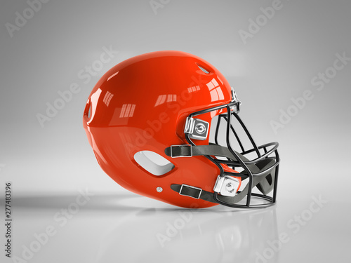 Red American football helmet isolated on grey mockup 3D rendering photo