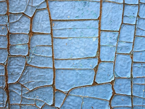 blue cracked background, wooden painted furniture plate