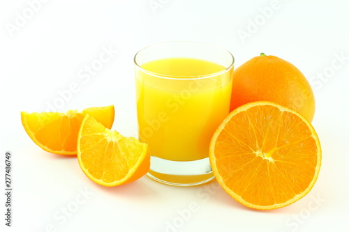 glass of orange juice and fresh orange fruits isolated on a white background