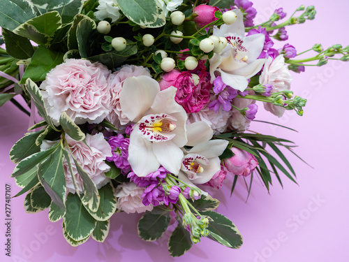 Wedding bouquet of orchids,matiolli, carnations, beautiful delicate flowers.
