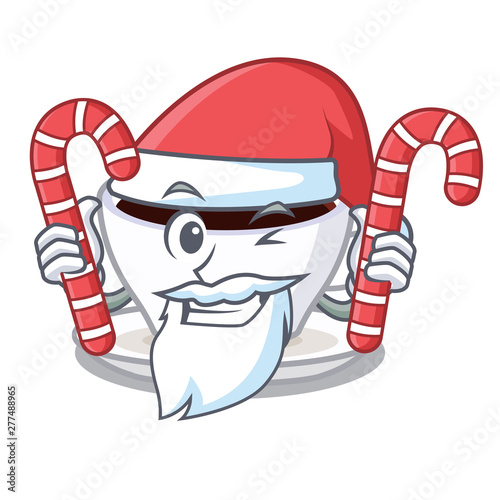 Santa with candy character latte macchiato in the fridge