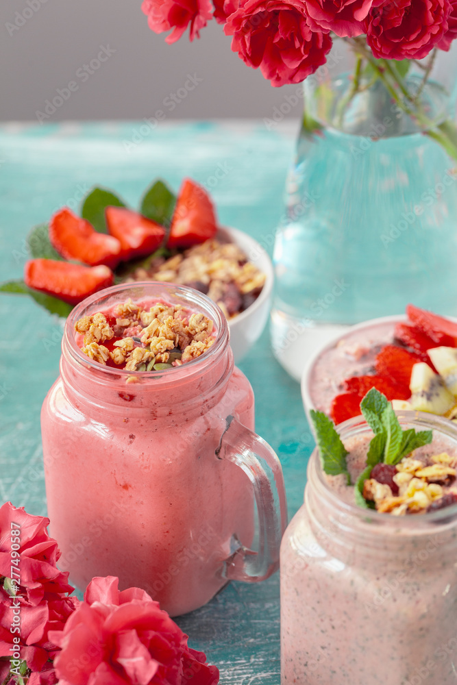 smoothie with granola for healthy breakfast. Selective focus smoothie with granola for healthy breakfast. Selective focus
