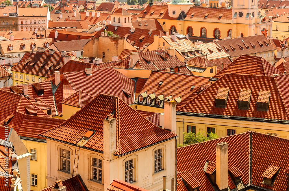 Red tiled roofs of Prague. Ancient architecture of Europe. City landscape. Red tiled roofs of Prague. Ancient architecture of Europe. City landscape.
