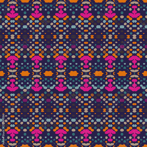 Ikat seamless pattern. Vector tie dye shibori print with stripes and chevron. Ink textured background. Patchwork print.