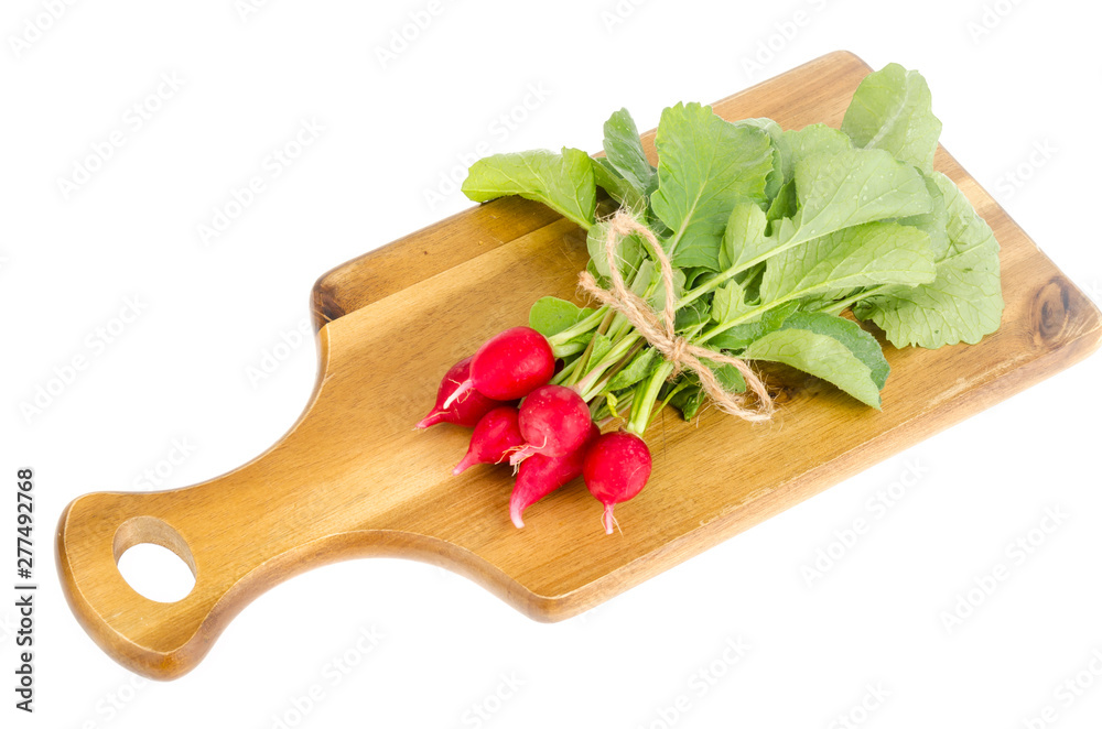 Bunch of fresh red radish on wooden cutting board for cooking. Bunch of fresh red radish on wooden cutting board for cooking.