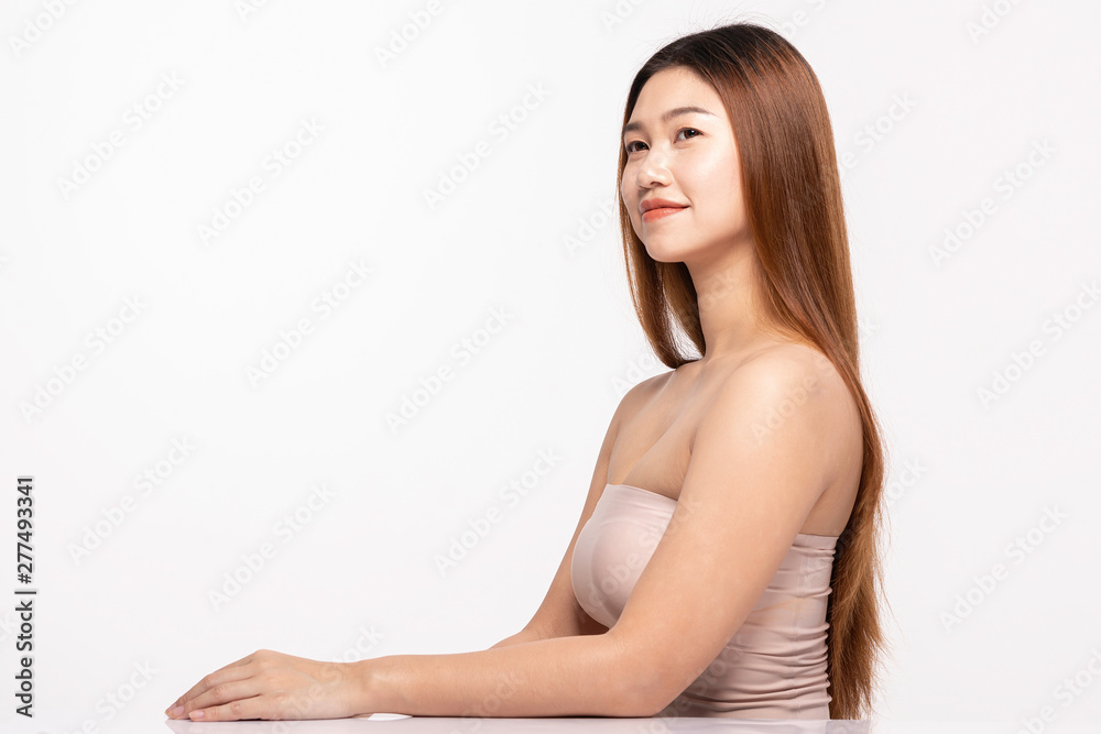 Side View Of Beautiful Young Asian Woman Looking Away While Touching Chin feeling so happy and cheerful with healthy Clean and Fresh skin,isolated on white background,Beauty Cosmetology Concept