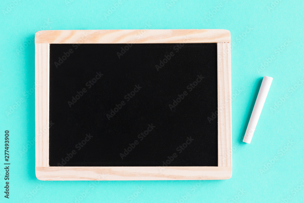 Blackboard with chalk on colored surface Blackboard with chalk on colored surface