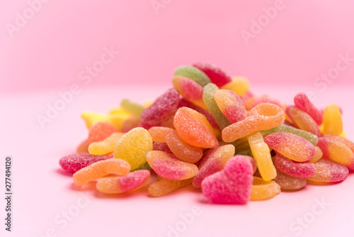 sugary jellies isolated on a pink background