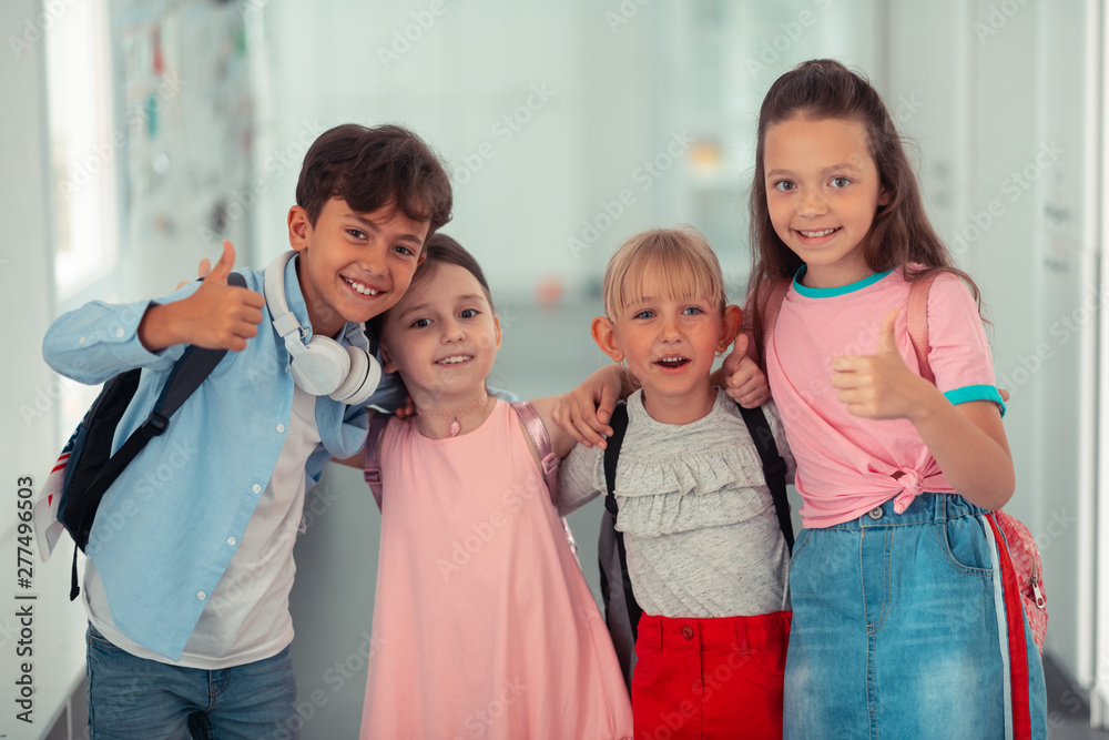 Boy and girls feeling excited before their summer holidays Boy and girls feeling excited before their summer holidays