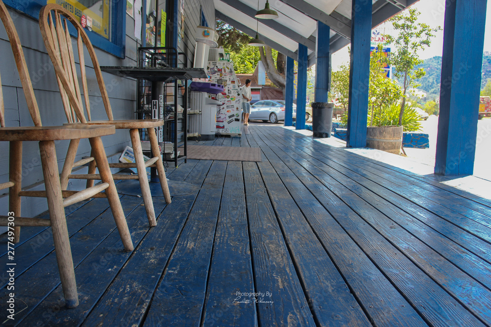 Blue wooden front porch of a country store