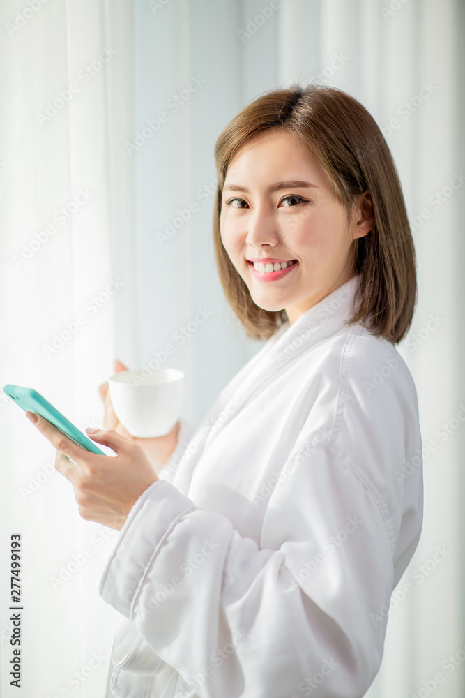 woman use smartphone in morning woman use smartphone in morning