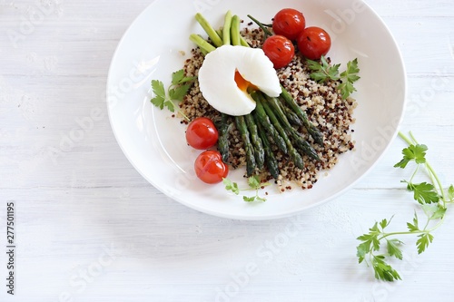 Quinoa with green asparagus, Poached Egg and grilled tomatoes. 