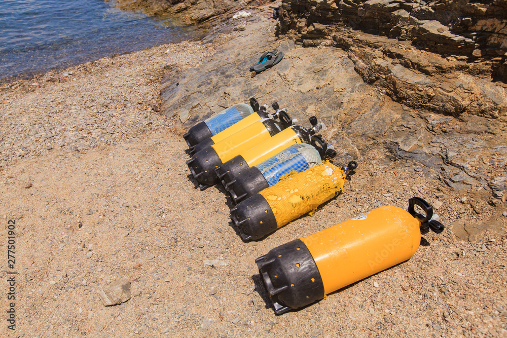 Scuba diving compressed air tanks on sand beach Stock Photo Adobe Stock