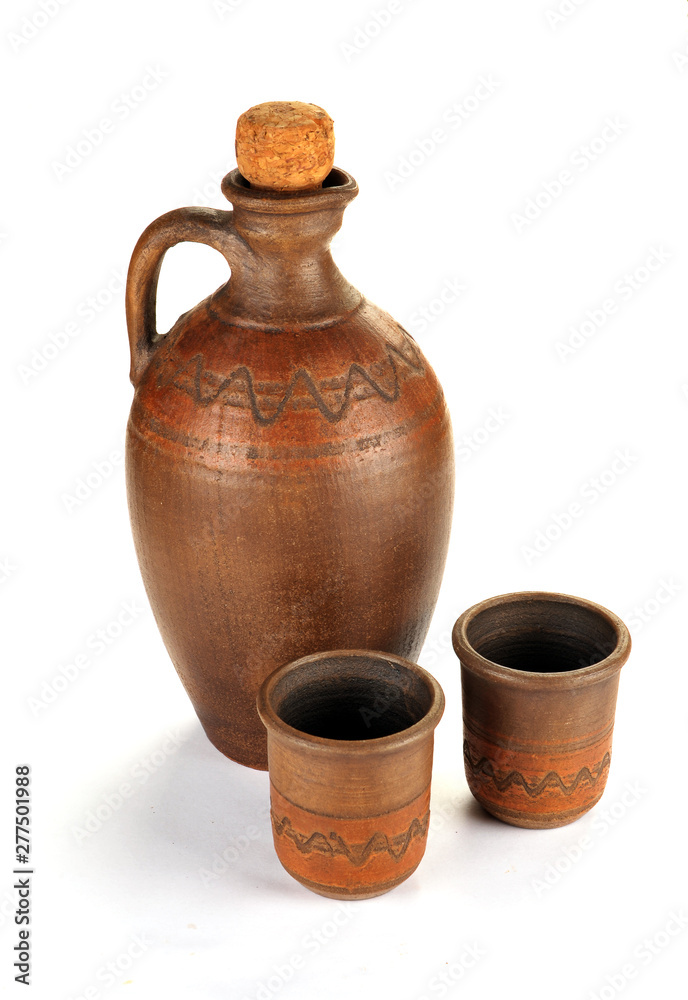 pitcher and two cups of clay