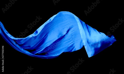 Smooth elegant blue transparent cloth isolated on black background. © Igor Normann