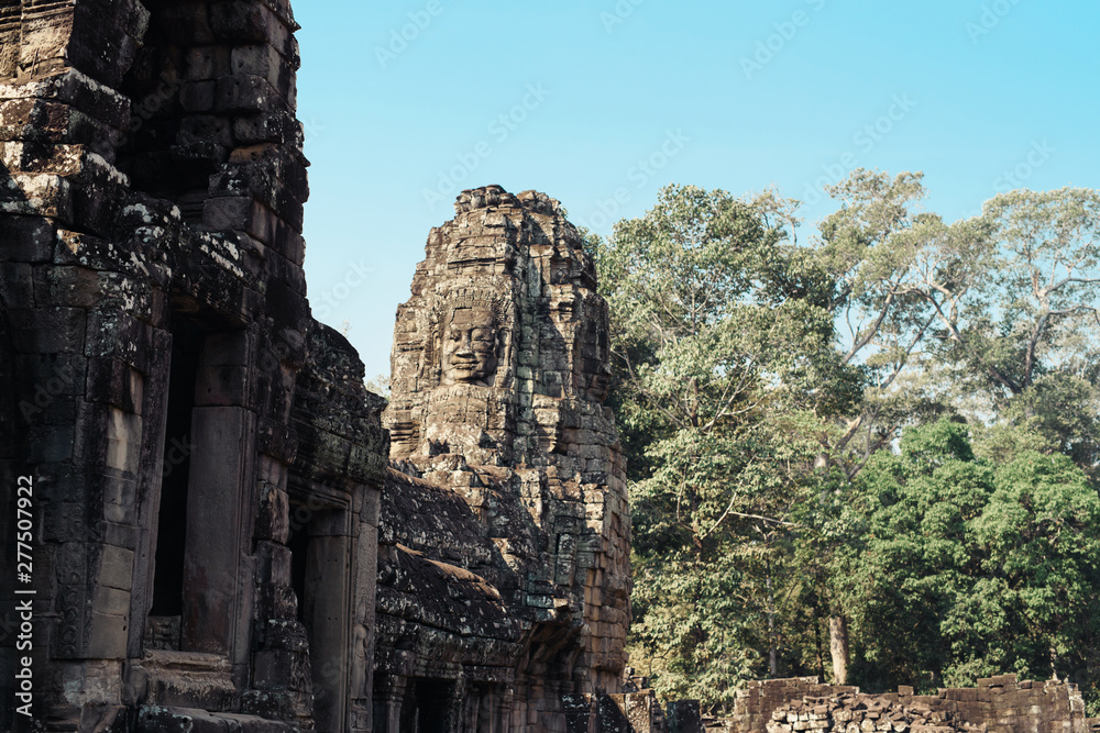 Faces of Bayon temple in Angkor Thom, Siemreap, Cambodia. The Prasat Bayon is a richly decorated Khmer temple at Angkor , ancient architecture in Cambodia