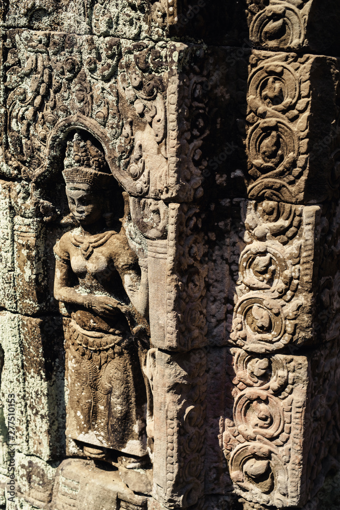 Ancient Khmer carving bas-relief. Wall of Bayon Temple, Angkor Thom, Siem Reap, Cambodia Ancient Khmer carving bas-relief. Wall of Bayon Temple, Angkor Thom, Siem Reap, Cambodia