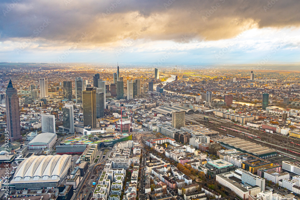 aerial of frankfurt with dark clouds and sunshine
