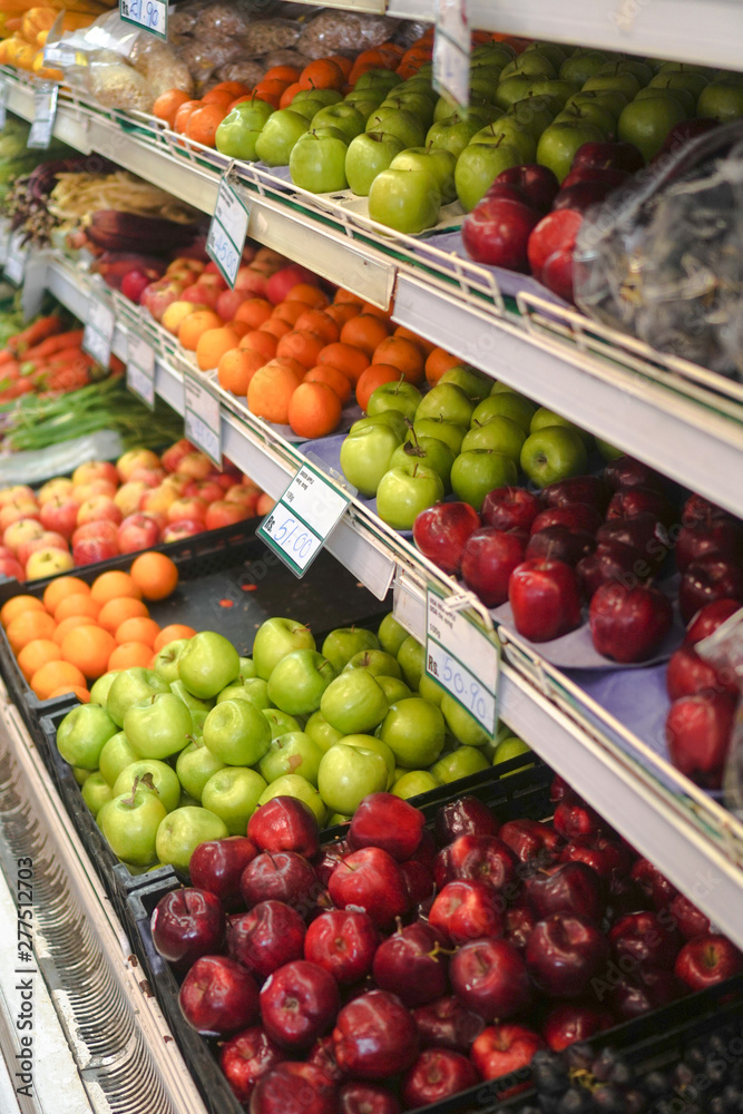 Supermarket in East Asia. Fruit on the counter of the store in Sri Lanka and India. Vegetarian green theme Supermarket in East Asia. Fruit on the counter of the store in Sri Lanka and India. Vegetarian green theme