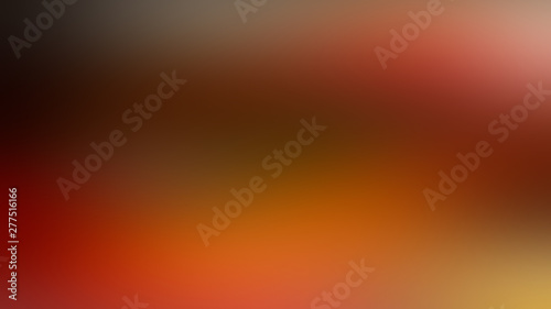 Red spot on a gray abstract blurred dark gradient background.