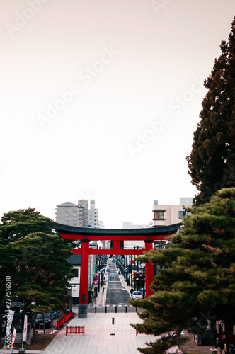 Wallpaper Mural Red Torii gate at Morioka Hachimangu Shrine in Iwate at sunset with warm tone sky Torontodigital.ca
