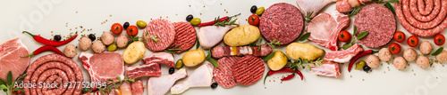 various types of italian raw meat with spices, vegetables and aromatic herbs. banner for supermarket or butcher photo