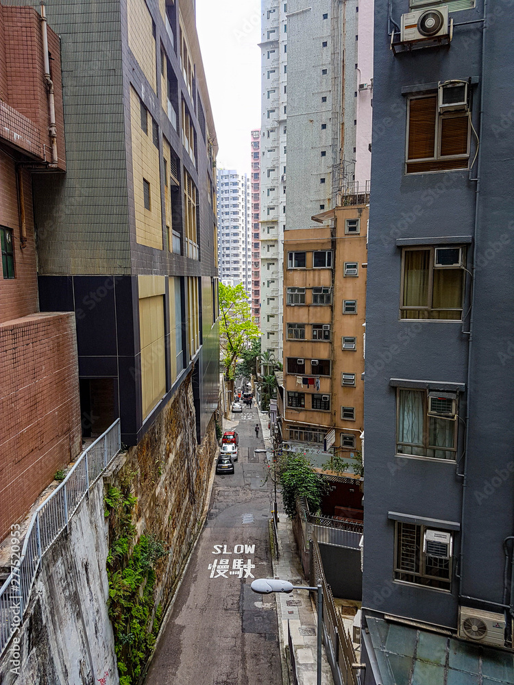 Fototapeta premium Old Street in Hong Kong with buildings