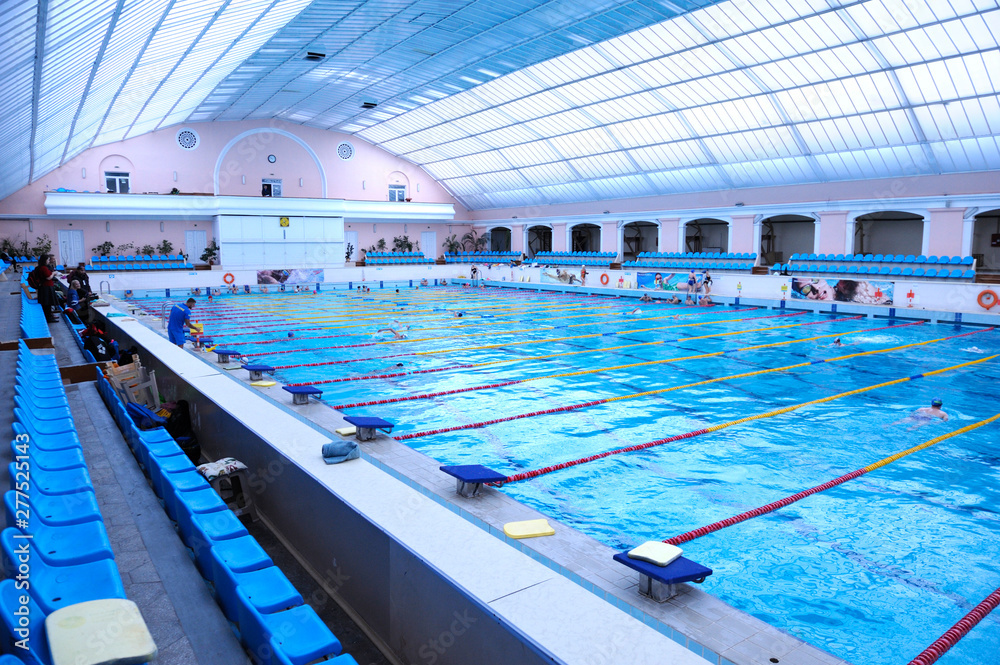 Interior of indoor swimming pool, paths  - obrazy, fototapety, plakaty 