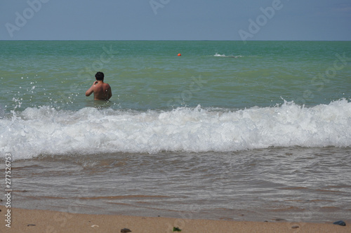 Man bathing in the black sea © Ekaterina