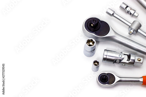 A set of tool heads for loosening screws, bolts and nuts. Ratchet screwdriver. White background