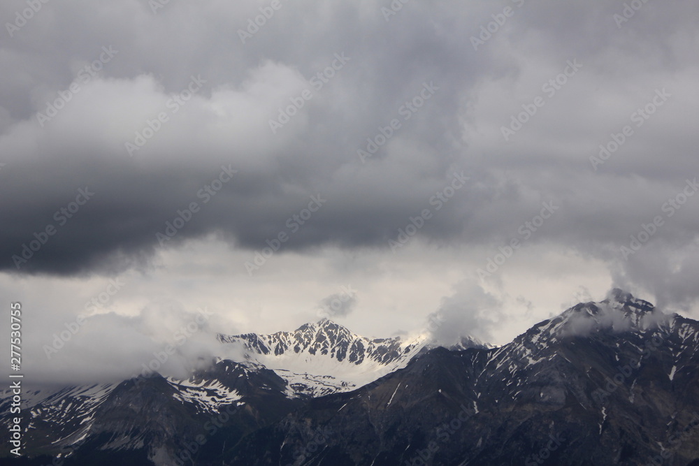 Cloudy day in the Swiss Alps. Mount Aroser Rothorn.