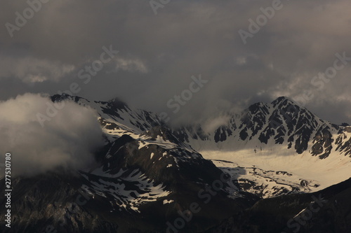 Aroser Rothorn seen from Obermutten, Switzerland. Cloudy summer day. photo