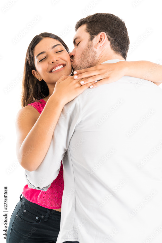 Affectionate Lovers Embracing Over Plain Background Affectionate Lovers Embracing Over Plain Background