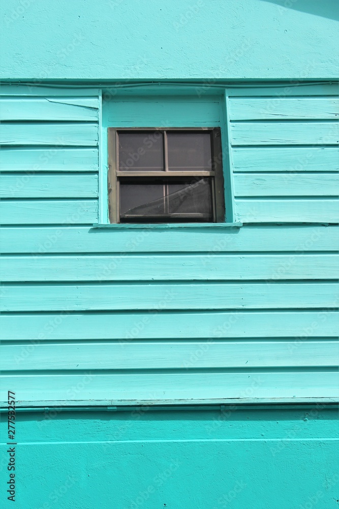 cyan bright blue vivid stairs with blue windows with house paint. painted wooden planks cyan bright blue vivid stairs with blue windows with house paint. painted wooden planks