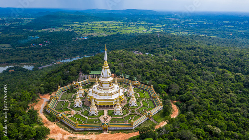 Aerial view Phra Maha Chedi Chai Mongkol or Phanamtip temple, Roi Et, Thailand. © Kalyakan
