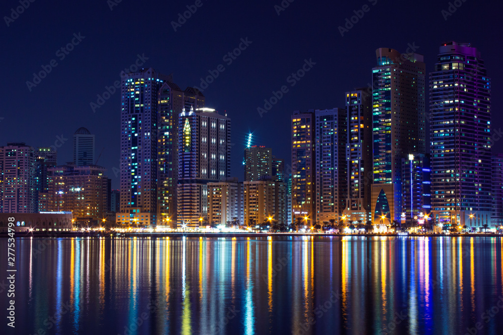 United Arab Emirates, Sharjah skyline at night, reflection at Khalid Lake