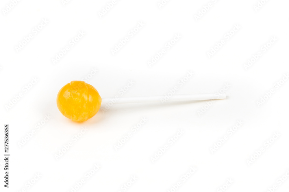 Single colorful candy sucker on a stick Single colorful candy sucker on a stick