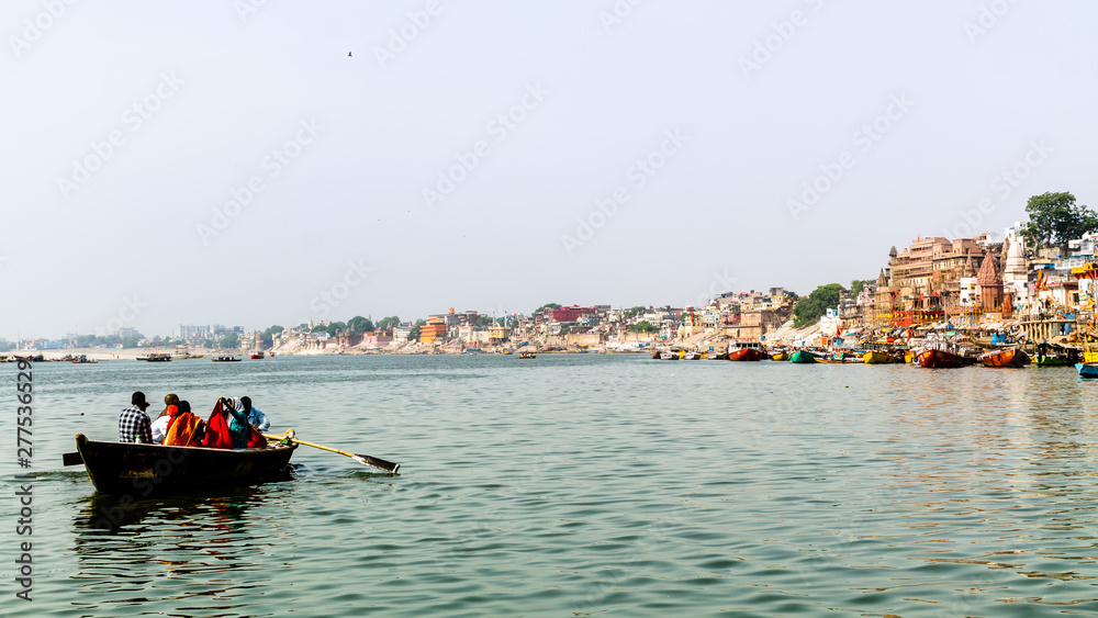 A view of historic Varanasi ghats, ancient temples and buildings along the river Ganges